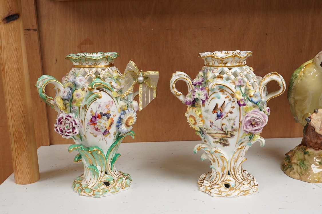 A near pair of English porcelain flower encrusted vases, c.1830, possibly Coalbrookdale, 21cm high
